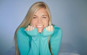 Young woman with perfect white teeth