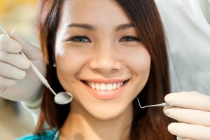 Woman at dentist - LANAP treats gum disease 