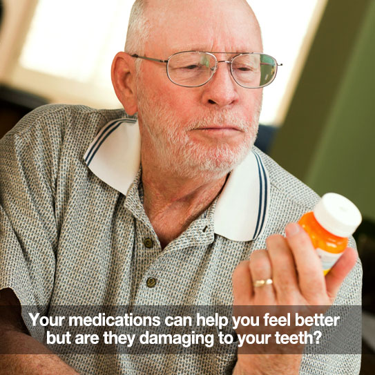 Elderly man reading medication label