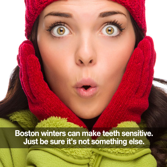 Woman bundled in winter hat and gloves with a cold look on her face