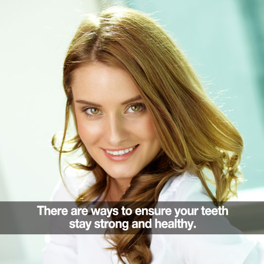 Beautiful woman smiling. Caption: There are ways to ensure your teeth stay strong and healthy.