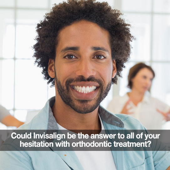 Man smiling. Caption:  Could Invisalign be the answer to orthodontic treatment?