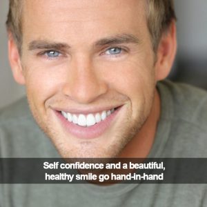 Man smiling. Caption: Self-confidence and a beautiful, healthy smile go hand-in-hand