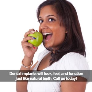 Woman about to bite an apple. Caption: Dental implants look, feel, and function, like natural teeth.