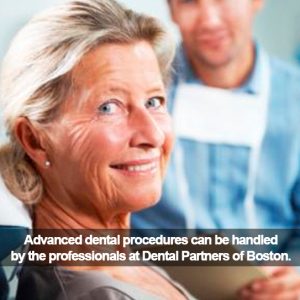 Elderly woman with dentist smiling. Caption: Advanced dental procedures by Dental Partners of Boston