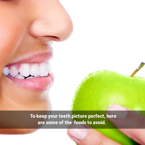 Woman eating an apple. Caption: To keep your teeth picture perfect, here are some of the foods to avoid