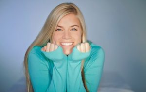 Blond woman smiling. There are many ways to whiten your teeth in Boston.