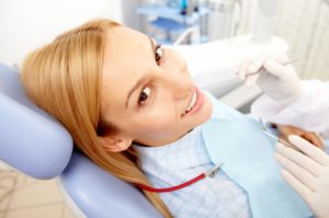 Sedation dentistry helps ease a woman's nervousness at the dentist