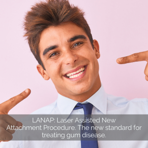 Man without gum disease is pointing at his healthy smile