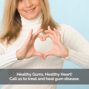 Gum disease affects the heart. A woman forms a heart shape with her fingers.