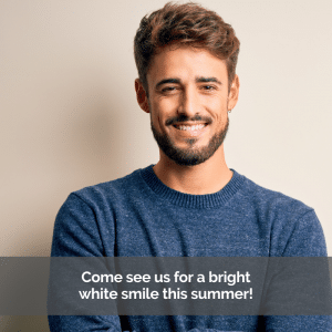 Man smiling with healthy white teeth over a tan background