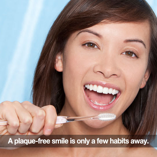 Woman brushing her teeth. Caption: A plaque-free smile is only a few habits away.