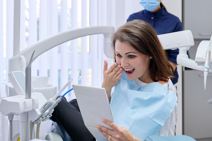 happy female dental implant patient 