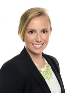 Attractive young woman with blond hair headshot