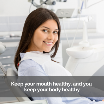 Woman in dental chair: Keep your mouth healthy and you keep your body healthy