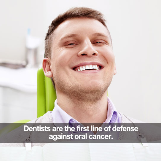 Male dental patient in dental chair. Caption: Dentists are the first line of defense against oral cancer.