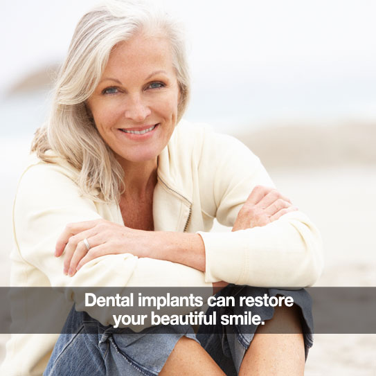 Woman smiling. Caption: Dental implants can restore your beautiful smile.